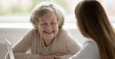 Two women speaking